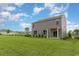 Exterior of home featuring a spacious yard and covered porch at 692 Wallace Dr., Little River, SC 29566