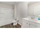 Cozy bathroom featuring a shower and tub combo, along with modern vanity and toilet at 692 Wallace Dr., Little River, SC 29566