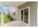 View of the backyard patio including an outdoor seating area at 692 Wallace Dr., Little River, SC 29566