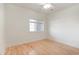 Bright bedroom with light wood floors, neutral walls, and a ceiling fan at 750 Charter Dr. # E-2, Longs, SC 29568