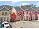 Charming multi-colored townhomes with inviting entrances, small patios and ample parking spaces at 763 Moen Pl. # 763-A, Myrtle Beach, SC 29577