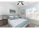 Bedroom showcases a soothing palette, ceiling fan and ample natural light at 763 Moen Pl. # 763-A, Myrtle Beach, SC 29577