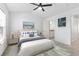 Stylized bedroom featuring a neutral color scheme, ceiling fan and ample natural light at 763 Moen Pl. # 763-A, Myrtle Beach, SC 29577