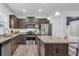 Modern kitchen with granite countertops, stainless steel appliances and a kitchen island at 820 Wild Leaf Loop, Conway, SC 29526