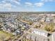 Expansive aerial view of a community with colorful homes, green spaces, and a winding waterway at 823 Howard Ave., Myrtle Beach, SC 29577