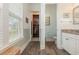 Bright bathroom with tile flooring, featuring a walk-in closet and closet with toilet at 823 Howard Ave., Myrtle Beach, SC 29577