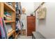 Organized walk-in closet with wooden shelves and drawers, providing ample storage space for clothing and accessories at 823 Howard Ave., Myrtle Beach, SC 29577