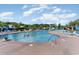 Large community pool with lounge chairs and umbrellas, perfect for relaxation and recreation at 823 Howard Ave., Myrtle Beach, SC 29577