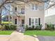 Charming two-story home with a welcoming front porch and beautiful landscaping at 823 Howard Ave., Myrtle Beach, SC 29577