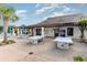 Outdoor recreation area with ping pong tables, seating, and lovely pergola at 823 Howard Ave., Myrtle Beach, SC 29577