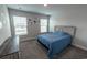 Bright bedroom with carpet, sunny windows, and farmhouse chic headboard at 860 Saluda River Rd., Myrtle Beach, SC 29588