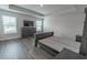 Bedroom features wood-look flooring and a neutral color palette at 860 Saluda River Rd., Myrtle Beach, SC 29588