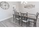 Charming dining room with a dark table, comfortable seating, and modern lighting at 860 Saluda River Rd., Myrtle Beach, SC 29588