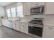 Well-equipped kitchen with stainless steel appliances and sleek countertops at 860 Saluda River Rd., Myrtle Beach, SC 29588