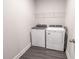 Bright laundry room with modern washer and dryer units at 860 Saluda River Rd., Myrtle Beach, SC 29588