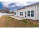 Well-maintained backyard with a patio, green grass and a white fence at 92 Costa Ct., Pawleys Island, SC 29585