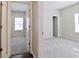 View of two carpeted bedrooms, showing layout and neutral color scheme at 92 Costa Ct., Pawleys Island, SC 29585