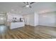 Open-concept kitchen and dining area with modern appliances and sleek flooring at 92 Costa Ct., Pawleys Island, SC 29585