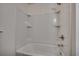 Bathroom tub and shower combo featuring built-in shelving at 935 Little Creek Rd., Myrtle Beach, SC 29572