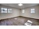 Bright bedroom with wood-look flooring and ample natural light at 935 Little Creek Rd., Myrtle Beach, SC 29572