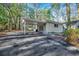 View of the carport attached to the home, with large parking area at 935 Little Creek Rd., Myrtle Beach, SC 29572