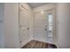 Bright entryway features a door with decorative glass and hardwood-style floors at 935 Little Creek Rd., Myrtle Beach, SC 29572