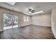 Bright living room with sliding glass door that leads to the backyard at 935 Little Creek Rd., Myrtle Beach, SC 29572