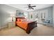 Comfortable bedroom with French doors, a sled bed, and calming color palette at 938 Wallace Pate Dr., Georgetown, SC 29440