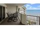 Relaxing balcony with seating and ocean views, perfect for enjoying coastal breezes at 9994 Beach Club Dr. # 2408, Myrtle Beach, SC 29572