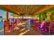 Vibrant beach bar interior with colorful furniture and direct beach access at 9994 Beach Club Dr. # 2408, Myrtle Beach, SC 29572