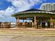 Charming outdoor beach bar with seating and ocean views, perfect for relaxation at 9994 Beach Club Dr. # 2408, Myrtle Beach, SC 29572