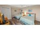 Comfortable bedroom with two twin beds, wood floor and coastal decor at 9994 Beach Club Dr. # 2408, Myrtle Beach, SC 29572