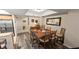 Inviting dining room with seating for six, with a wood table and gray wood-look flooring at 9994 Beach Club Dr. # 2408, Myrtle Beach, SC 29572