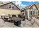 Outdoor deck featuring comfortable seating, a grill, and a serene view of the wooded backyard at 1 Sun Ct., Carolina Shores, NC 28467