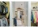 Walk-in closet featuring shelves, hanging storage and ensuite access at 1 Sun Ct., Carolina Shores, NC 28467
