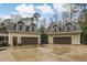 Image showing detached garages with ample parking space and inviting curb appeal at 1 Sun Ct., Carolina Shores, NC 28467
