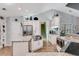 Modern kitchen with white cabinets, stainless steel appliances, and granite countertops at 1 Sun Ct., Carolina Shores, NC 28467