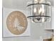 A picture and light fixture decorates the wall at 100 Spanish Oak Ct. # H, Surfside Beach, SC 29575