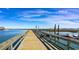 Long pier stretching into the water, with a view of the coastline at 106 Bayou Loop # Lot 4, Surfside Beach, SC 29575