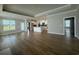 Expansive living room with hardwood floors flowing into an open-concept kitchen with a center island at 1067 Laconic Dr., Myrtle Beach, SC 29588