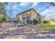 Backyard featuring an outdoor patio, seating area, and well maintained lawn with mature landscaping at 110 Summerlight Dr., Murrells Inlet, SC 29576