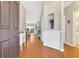 Inviting foyer with hardwood floors, elegant trim, and a view into the spacious living area, creating an open atmosphere at 110 Summerlight Dr., Murrells Inlet, SC 29576
