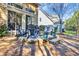 Outdoor patio with comfortable seating, fire pit, and grill perfect for entertaining with a lawn view at 110 Summerlight Dr., Murrells Inlet, SC 29576