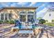 Outdoor patio featuring a fire pit and chairs with a view of the yard and exterior of the home at 110 Summerlight Dr., Murrells Inlet, SC 29576