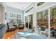 Bright sun room with lots of natural light coming through the windows and sliding glass doors to the patio at 110 Summerlight Dr., Murrells Inlet, SC 29576