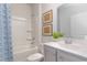 Bright bathroom with a shower-tub combo, sleek fixtures, and a modern design at 1110 Black Lake Way, Conway, SC 29526