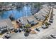 An aerial shot of the community shows homes surrounding a lake at 118 Gully Branch Ln. # 3, Myrtle Beach, SC 29572