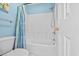A full bathroom with toilet and shower/bath combo behind a white door at 118 Gully Branch Ln. # 3, Myrtle Beach, SC 29572