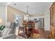 Cozy dining area adjacent to kitchen, featuring a dining table and bright natural light at 118 Gully Branch Ln. # 3, Myrtle Beach, SC 29572
