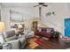 Open-concept living area with dining space, featuring hardwood floors and comfortable seating at 118 Gully Branch Ln. # 3, Myrtle Beach, SC 29572